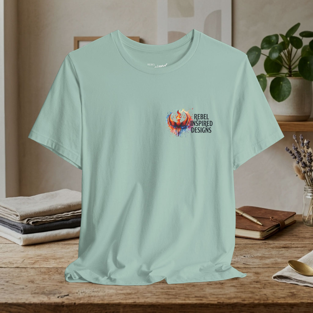 Rebel Inspired Designs Logo T-Shirt | Phoenix Watercolor Chest Print | Together We Rise Graphic Tee